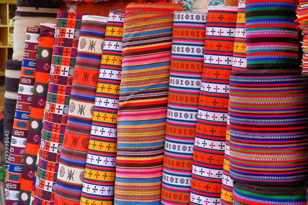 Ταπετσαρία Colorful carpets covered by traditional motifs in a local market in Lhasa, Tibet