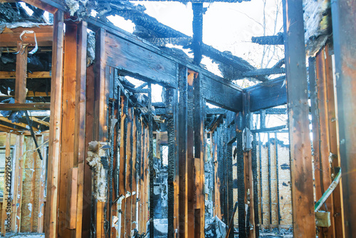 Burnt black house after fire damaged interior details arson from a home photo
