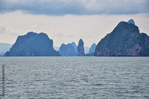 Island, Ocean views near Phuket Thailand with Blues, Turquoise and Greens oceans, mountains, boats, caves, trees resort island of phuket Thailand. Including Phi Phi, Ko Rang Yai, Ko Li Pe and other is © Jeremy