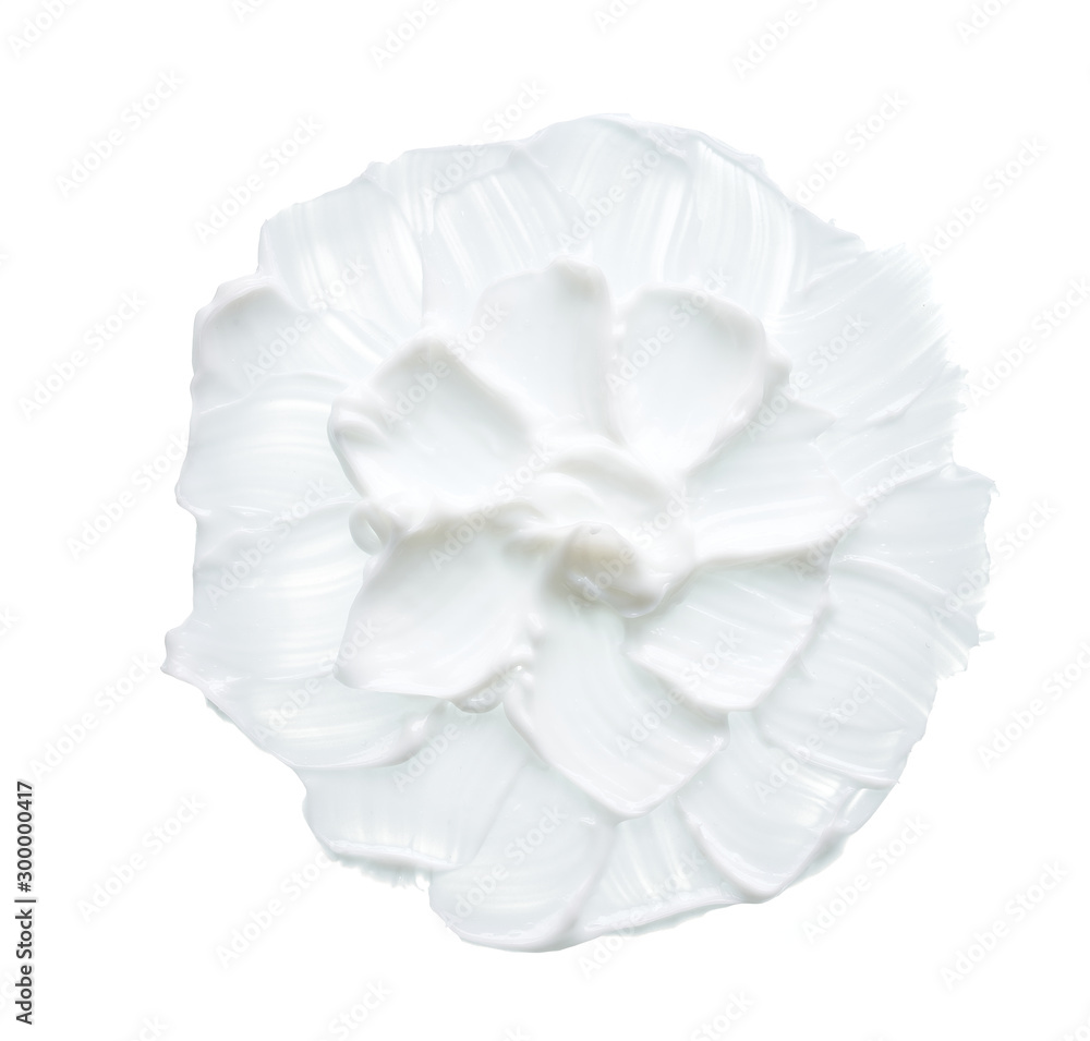 White texture and smear of face cream or white acrylic paint isolated on white background White texture and smear of face cream or white acrylic paint isolated on white background
