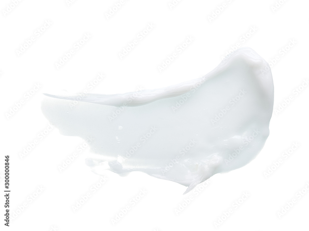 White texture and smear of face cream or white acrylic paint isolated on white background White texture and smear of face cream or white acrylic paint isolated on white background