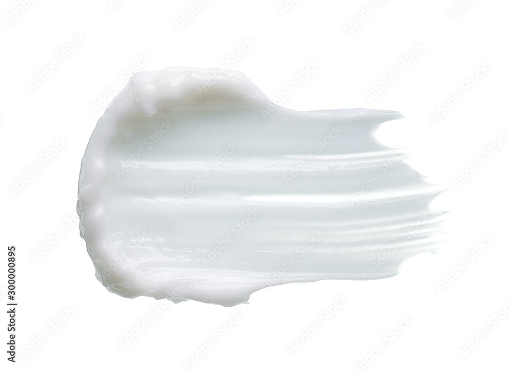 White texture and smear of face cream or white acrylic paint isolated on white background White texture and smear of face cream or white acrylic paint isolated on white background