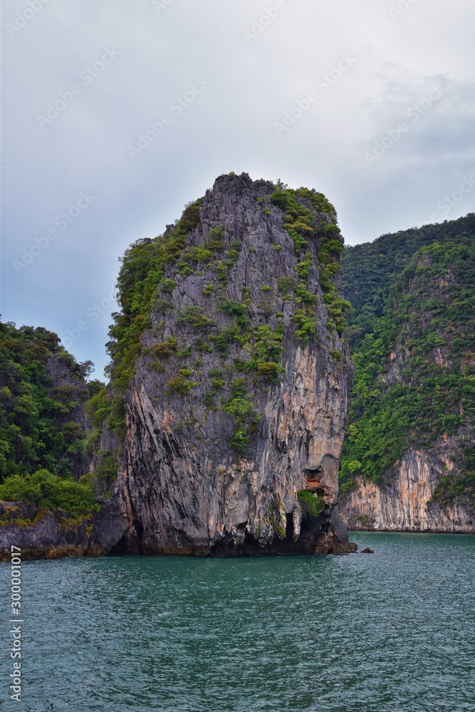 Island, Ocean views near Phuket Thailand with Blues, Turquoise and Greens oceans, mountains, boats, caves, trees resort island of phuket Thailand. Including Phi Phi, Ko Rang Yai, Ko Li Pe and other is Island, Ocean views near Phuket Thailand with Blues, Turquoise and Greens oceans, mountains, boats, caves, trees resort island of phuket Thailand. Including Phi Phi, Ko Rang Yai, Ko Li Pe and other is