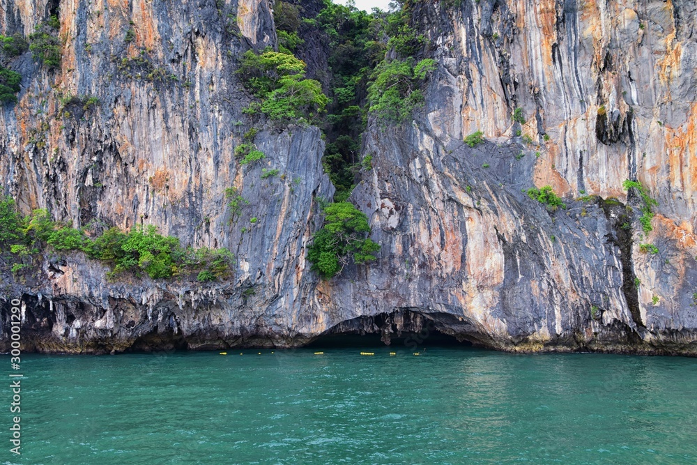 Island, Ocean views near Phuket Thailand with Blues, Turquoise and Greens oceans, mountains, boats, caves, trees resort island of phuket Thailand. Including Phi Phi, Ko Rang Yai, Ko Li Pe and other is Island, Ocean views near Phuket Thailand with Blues, Turquoise and Greens oceans, mountains, boats, caves, trees resort island of phuket Thailand. Including Phi Phi, Ko Rang Yai, Ko Li Pe and other is