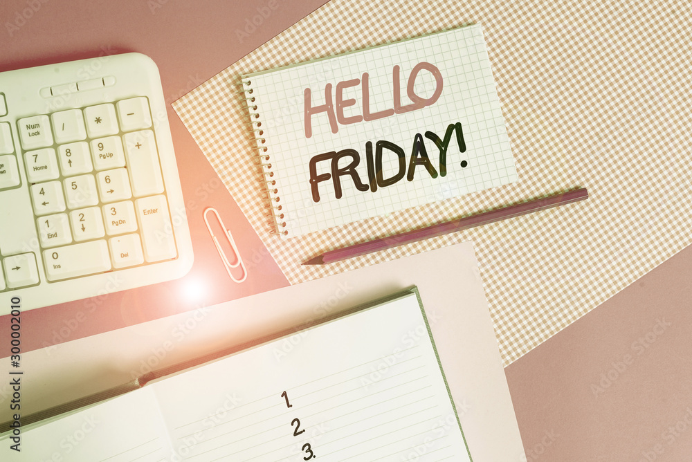 Writing note showing Hello Friday. Business concept for used to express happiness from beginning of fresh week Writing equipments and computer stuffs placed above colored plain table Writing note showing Hello Friday. Business concept for used to express happiness from beginning of fresh week Writing equipments and computer stuffs placed above colored plain table