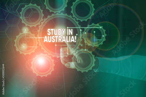 Handwriting text Study In Australia. Conceptual photo going into foreign country order complete your studies Picture photo system network scheme modern technology smart device