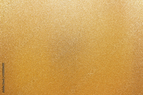 Golden sparkling backgound festive grains photo