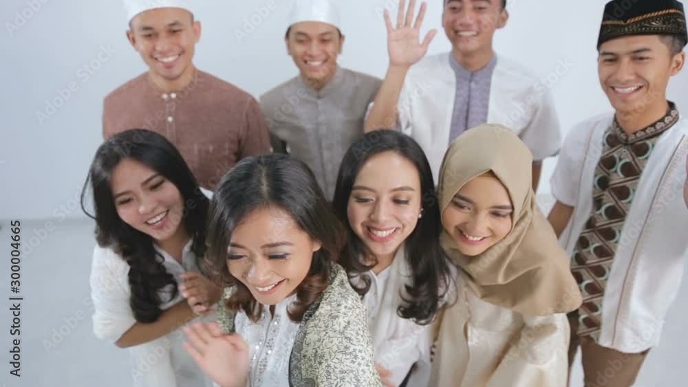 Group of happy muslim friends taking selfie together. eid mubarak ramadan kareem concept Group of happy muslim friends taking selfie together. eid mubarak ramadan kareem concept