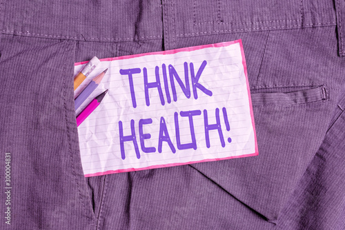 Text sign showing Think Health. Business photo text state of complete physical mental and social well being Writing equipment and white note paper inside pocket of man work trousers
