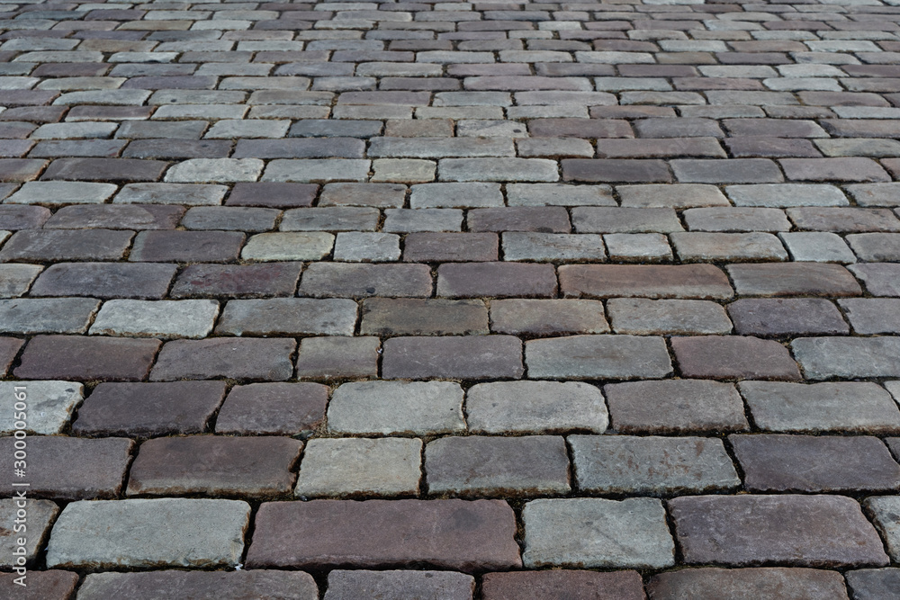Paving. Stone texture and background. The road surface is made of stone. Pedestrian zone made of stone