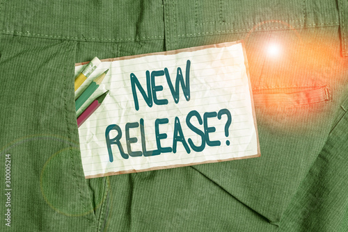 Text sign showing New Release Question. Business photo text asking about recent product or service newly unleashed Writing equipment and white note paper inside pocket of man work trousers