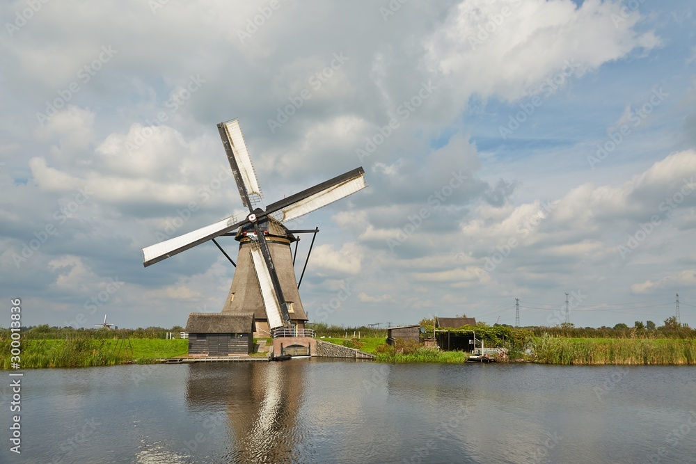 Old windmill on dutch landscape