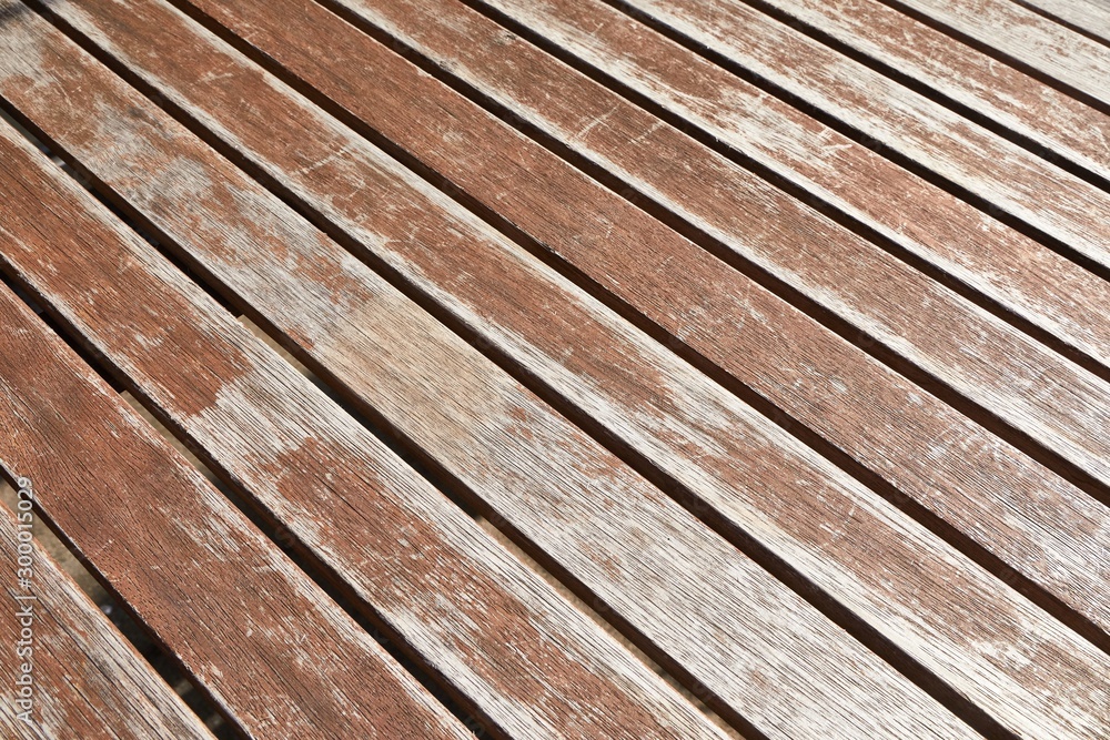 Wooden deck background lumber pattern, scratchy weathered Wooden deck background lumber pattern, scratchy weathered