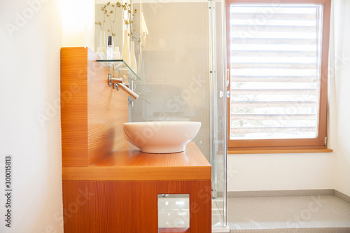 New home  bathroom vanity basin on a wooden top vanity