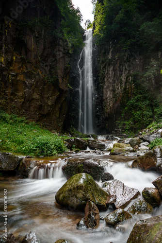 water fall and secret mountain, view of the wolf's fall in cembra's valley an hidden and screet place in the middle of italian alps