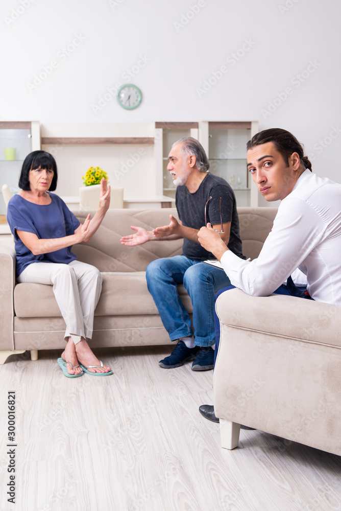 Old couple visiting psychiatrist doctor