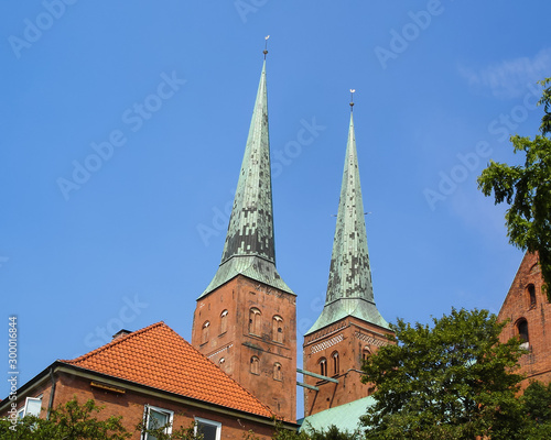 Close-up view of the two towers of the Lübeck Cathedral. Lubeck is the famous tourist destination in Schleswig-Holstein, northern Germany. UNESCO World Heritage