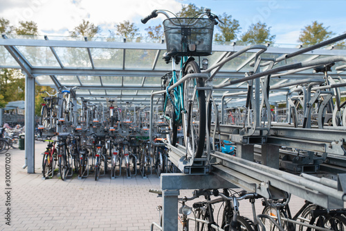 Many bikes stored in bicycle parking structure in Sweden