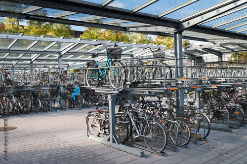 Many bikes stored in bicycle parking structure in Sweden
