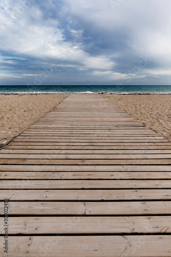 Wooden walkway on the beach of Bol Nou.