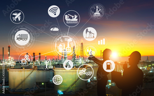 Engineering team is working at the oil and gas refinery factory zone in large energy industrial ,and physical system icons concept, Industry 4.0 concept at sunset. image