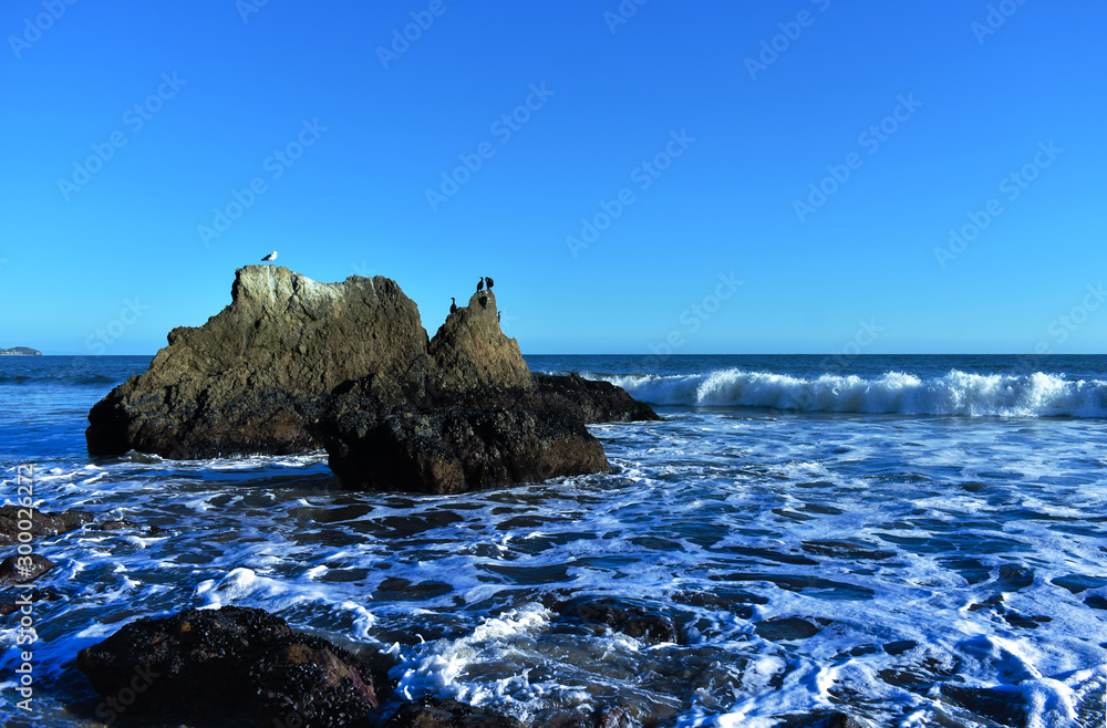 Rocks and Malibu beach in California