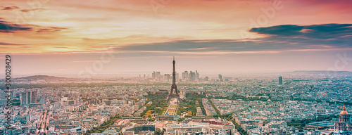 Photography aerial view over Paris at sunset with iconic Eiffel tower