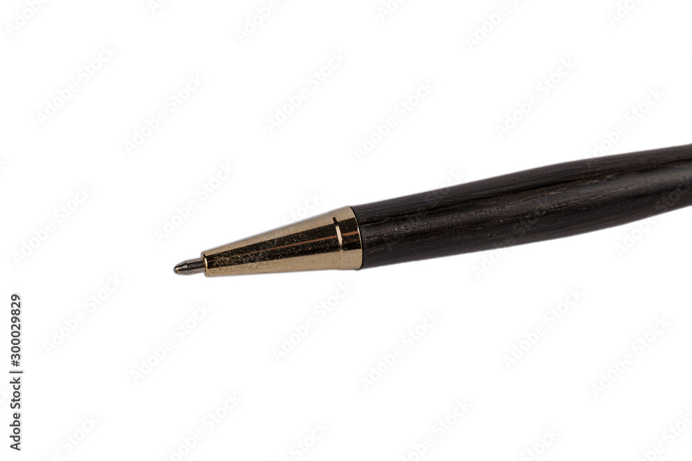 Elegant wooden ballpoint pen on a white background. Elegant wooden ballpoint pen on a white background.