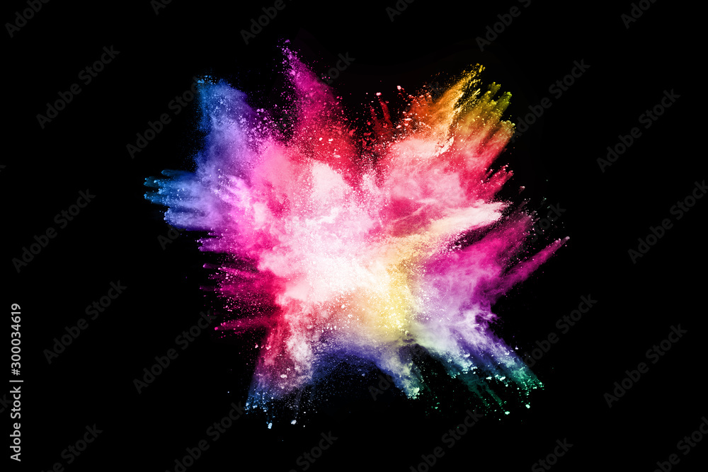 abstract colored dust explosion on a black background.abstract powder splatted background,Freeze motion of color powder exploding/throwing color powder, multicolored glitter texture.