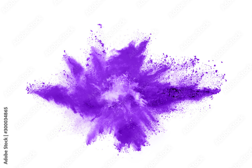 Obraz Powder explosion. Closeup of a purple dust particle explosion isolated on white. Abstract background.
