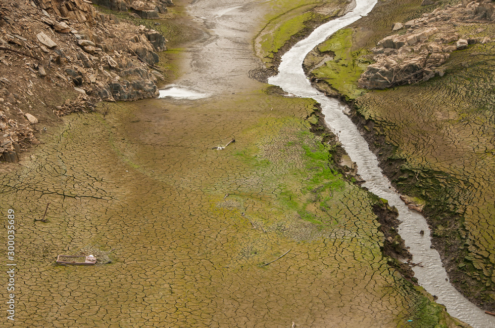 The Ponsul River is a affluent of the Tejo River, in Portugal, and is a very large river. At this time it is completely dry, without water and with its bed cracked due to climate change The Ponsul River is a affluent of the Tejo River, in Portugal, and is a very large river. At this time it is completely dry, without water and with its bed cracked due to climate change