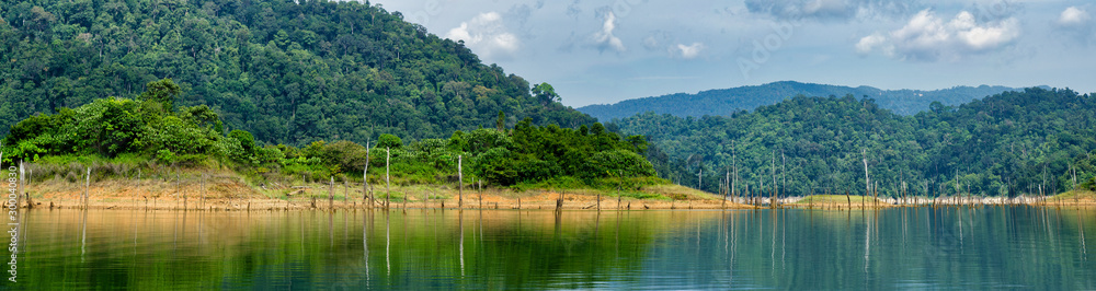 Beautiful image of rain-forest with reflection in water at Royal Belum State Park, Gerik Perak Malaysia. Beautiful image of rain-forest with reflection in water at Royal Belum State Park, Gerik Perak Malaysia.