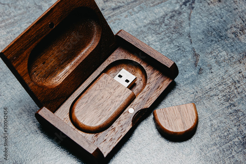 Fényképezés Wooden usb flash drive in a box of solid wood. Handwork.