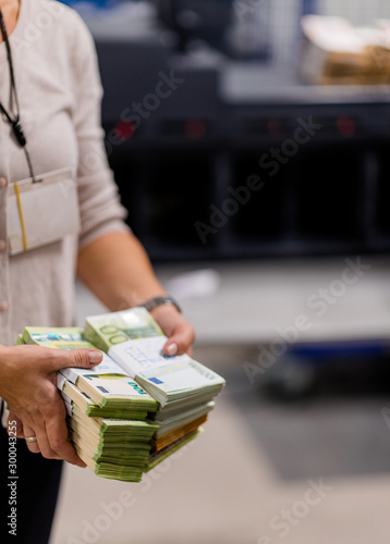 Accountant carrying vast amount of euro € money