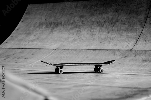 Fototapeta Naklejka Na Ścianę i Meble -  Skateboard from a distance on a ramp