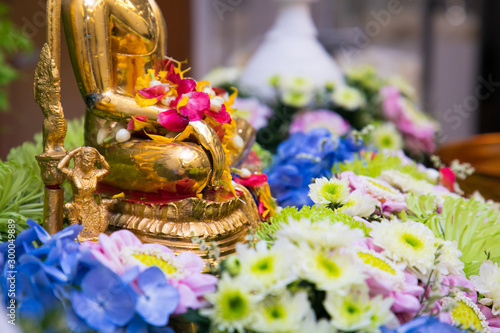 Buddha statue water ceremony in songkran festival.Thai festival Songkran.selective focus.