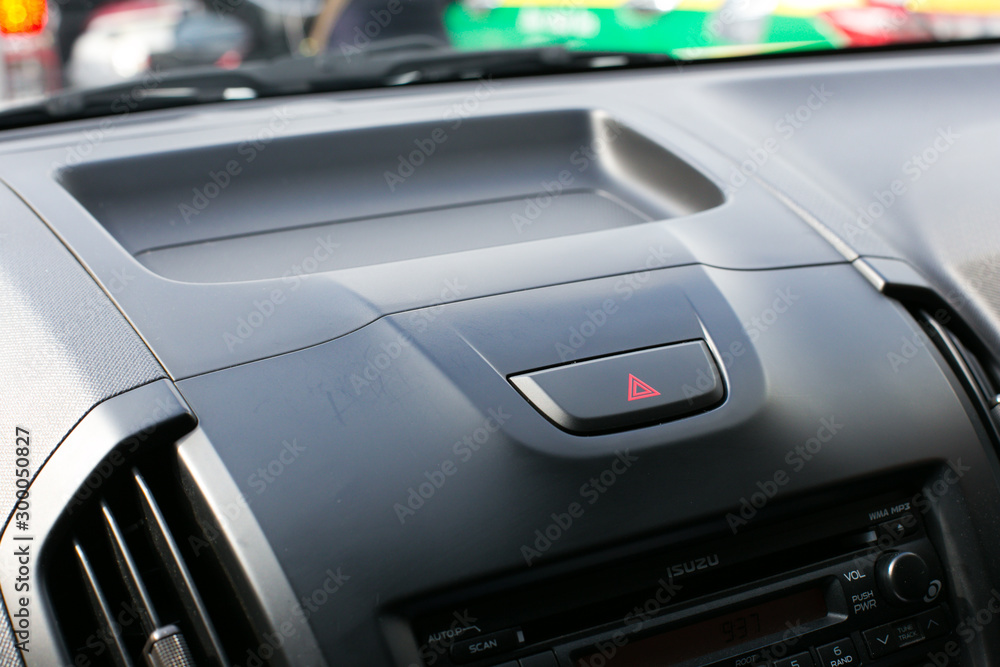 Detail of a warning button in a car