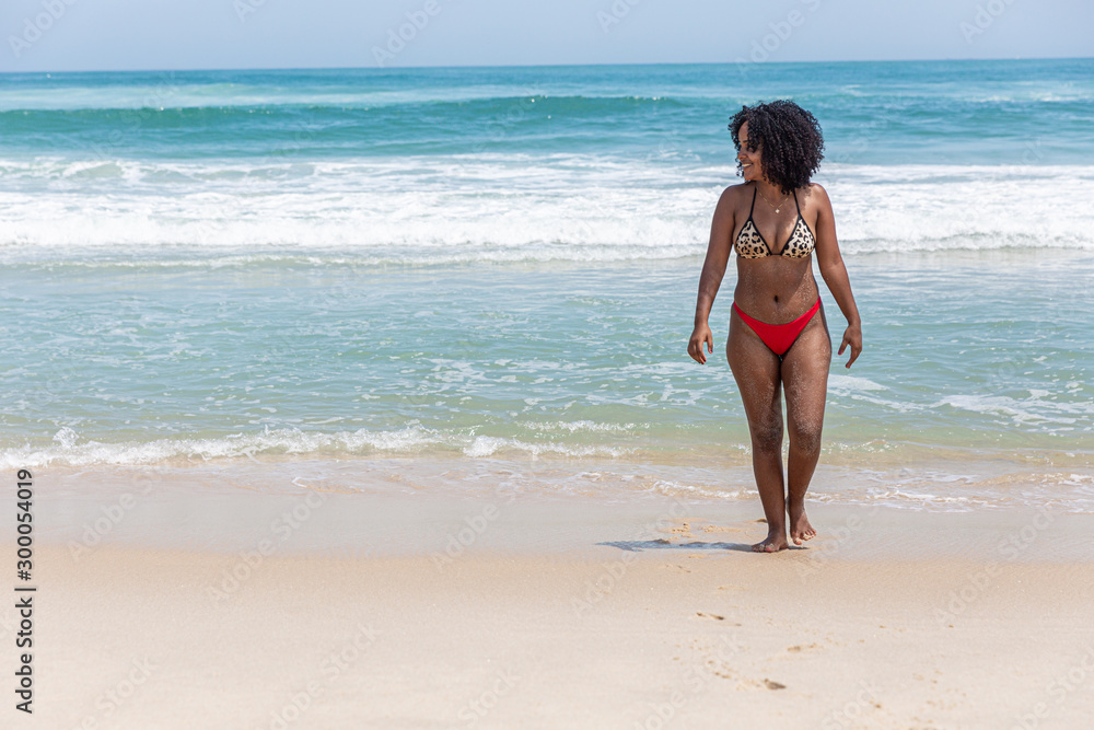 klok Oceaan Tegenstander Black afro young cute girl, curly hair, bikini, beach. Afro American summer  vacation holiday. Stock Photo | Adobe Stock