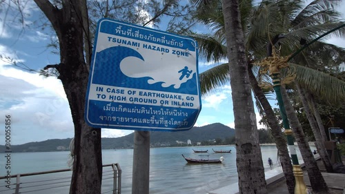 Tsunami warning sign on street at Patong beach in Phuket, Thailand. 
