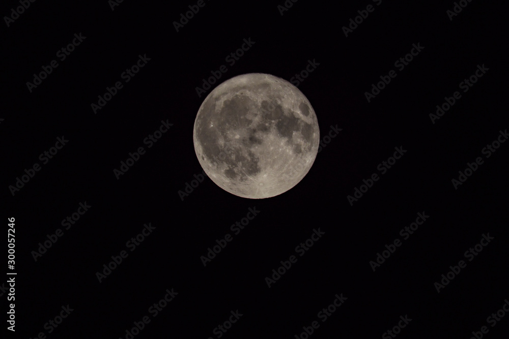 close up look of a full moon on pitch dark sky close up look of a full moon on pitch dark sky