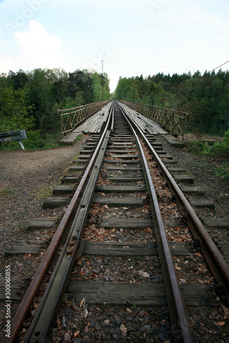 Train track on the historic iron railway bridge - Pilchowice Lake - Lower Silesia, Poland. industrial abstraction.