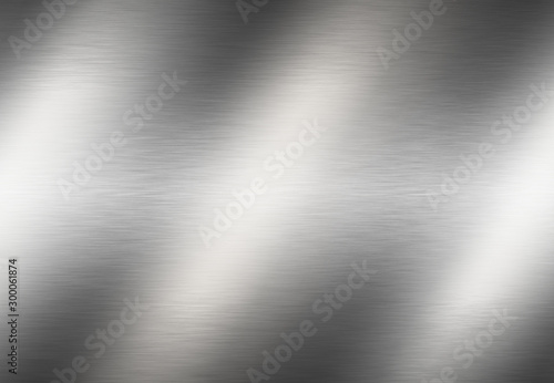 Stainless steel metal surface background or aluminum brushed silver texture with reflection.