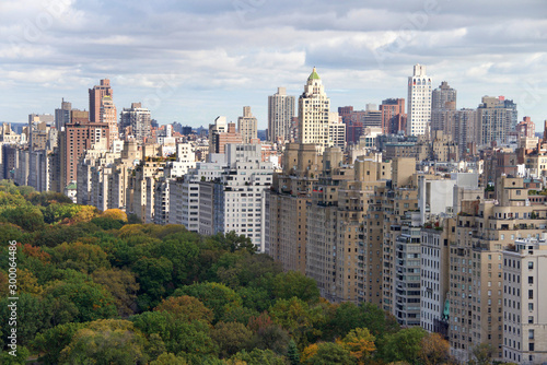 Buildings around Central Park in New York City. Aerial view from above on a cloudy overcast autumn day
