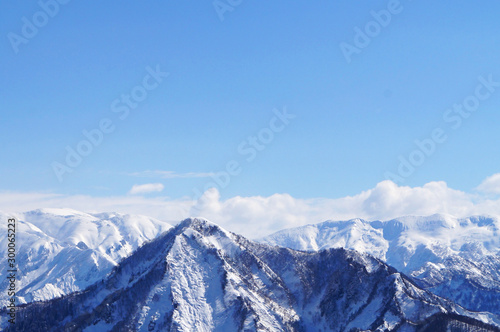 mountains in winter and blue sky © Rachanon