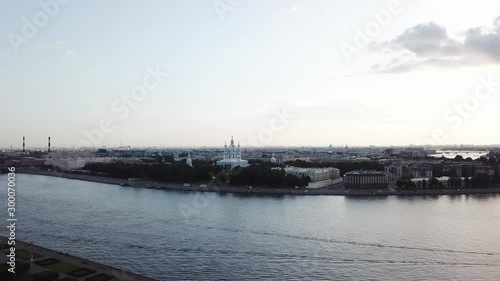 Aerial view of St. Petersburg Russia. Flying over the city center, river Neva, Smolniy cathedral and embankment on a summer day. photo