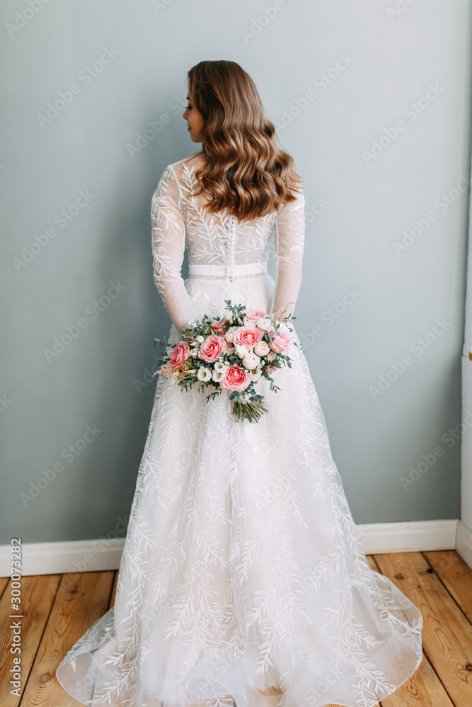 Stylish wedding in European style. Portrait of the bride in the style of fine art, white dress. Stylish wedding in European style. Portrait of the bride in the style of fine art, white dress.