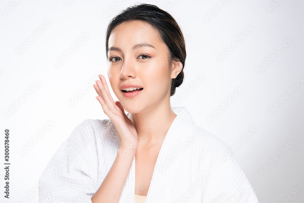 Beautiful young Asian woman touching soft cheek and smile with clean and fresh skin. Happiness and cheerful with, isolated on white background, Beauty and Cosmetics Concept, Beautiful young Asian woman touching soft cheek and smile with clean and fresh skin. Happiness and cheerful with, isolated on white background, Beauty and Cosmetics Concept,