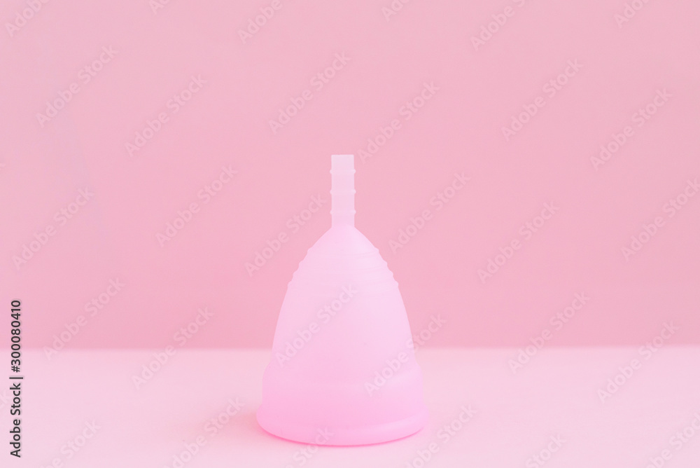 pink menstrual Cup on pink background. woman period concept. pink menstrual Cup on pink background. woman period concept.