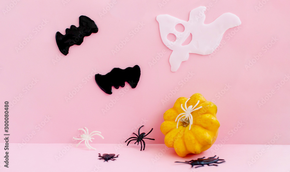 bats, spiders, pumpkin and Ghost on pink background. Halloween concept. bats, spiders, pumpkin and Ghost on pink background. Halloween concept.