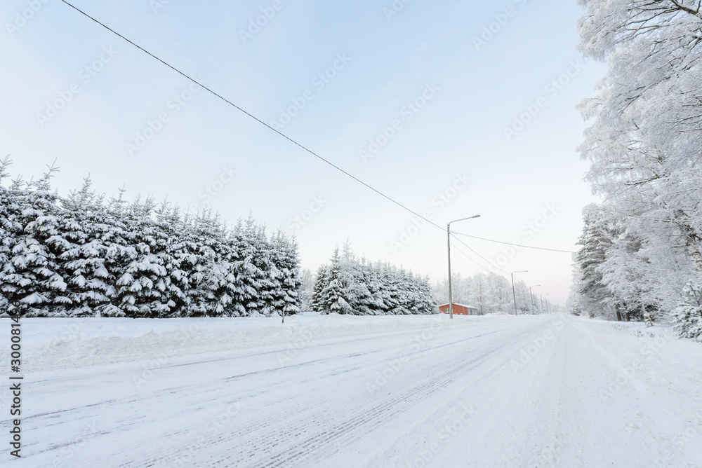 The road number 496 has covered with heavy snow in winter season at Lapland, Finland. The road number 496 has covered with heavy snow in winter season at Lapland, Finland.